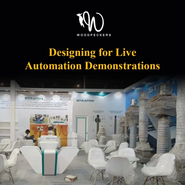Designing for Live Automation Demonstrations – Straton Industrial Exhibition Booth Exhibition booth for Straton Electricals conceptualized by Woodpeckers, designed for live automation demonstrations with industrial electrical equipment, branded backdrops, and consultation seating.