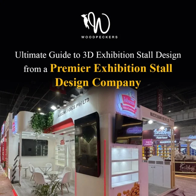 3D Exhibition Stall Design by Premier Design Company – Jabsons Foods Booth Custom 3D exhibition stall designed by Woodpeckers for Jabsons Foods Pvt Ltd, featuring illuminated signage, biophilic greenery, integrated LED digital screens, and back-lit product display shelves.