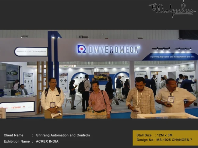 Custom Exhibition Stall Design by Top Stand Builders in India Spacious 12x3 meter custom exhibition booth designed by Woodpeckers for Shrirang Automation and Controls (DwyerOmega) at ACREX India trade show.