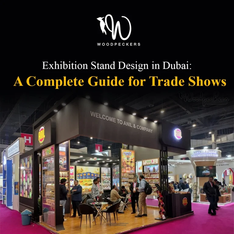 Modern exhibition stand designed and built by Woodpeckers for Anil & Company at a trade show, featuring illuminated 3D branding, product shelving, and client meeting areas.